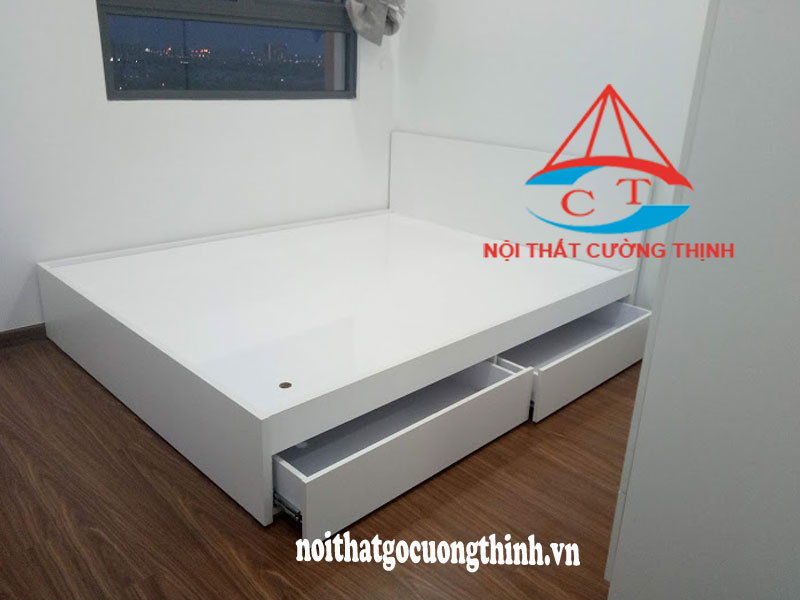 Mẫu giường ngủ gỗ màu trắng có ngăn kéo tại quận 2