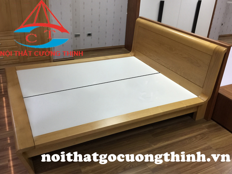 Giường ngủ 1m6 gỗ Sồi đẹp lắp đặt tại chung cư Quận 9 TPHCM, mẫu đuôi và đầu giường giường bo cong hiện đại.