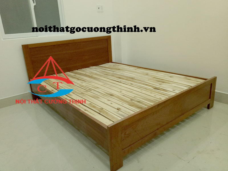 Mẫu giường 1m6 đẹp đóng bằng gỗ công nghiệp MDF phủ Veneer Xoan đào sơn PU màu nâu, lắp đặt tại Quận Thủ Đức
